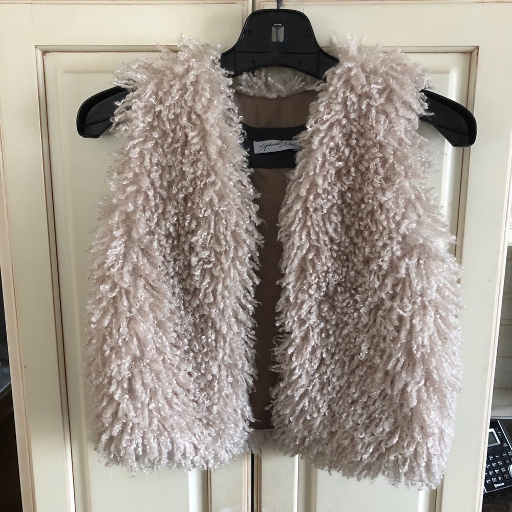 Curley lamb faux fur child’s vest